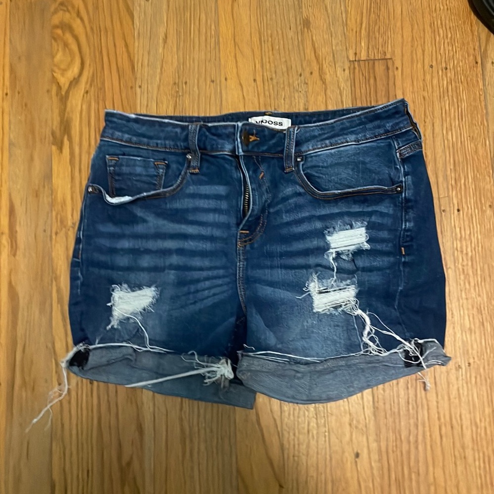 Dark blue ripped jean shorts
